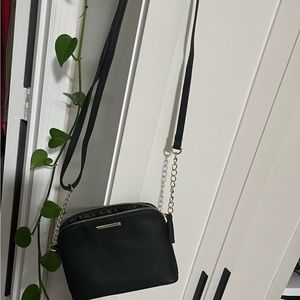 Small vinal black over shoulder bag .6”x 8”